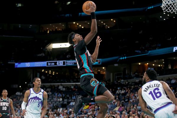 Feb 20, 2026; Memphis, Tennessee, USA; Memphis Grizzlies forward Olivier-Maxence Prosper (18) drives during the first quarter against the Utah Jazz at FedExForum. Mandatory Credit: Petre Thomas-Imagn Images