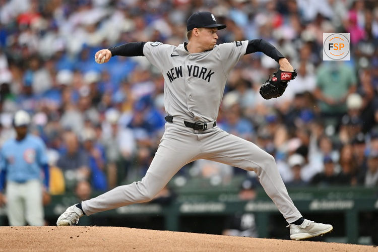 Jul 31, 2026; Chicago, Illinois, USA; New York Yankees starting pitcher Will Warren (29) pitches in the first inning against the Chicago Cubs  at Wrigley Field. Credit: Patrick Gorski-Imagn Images