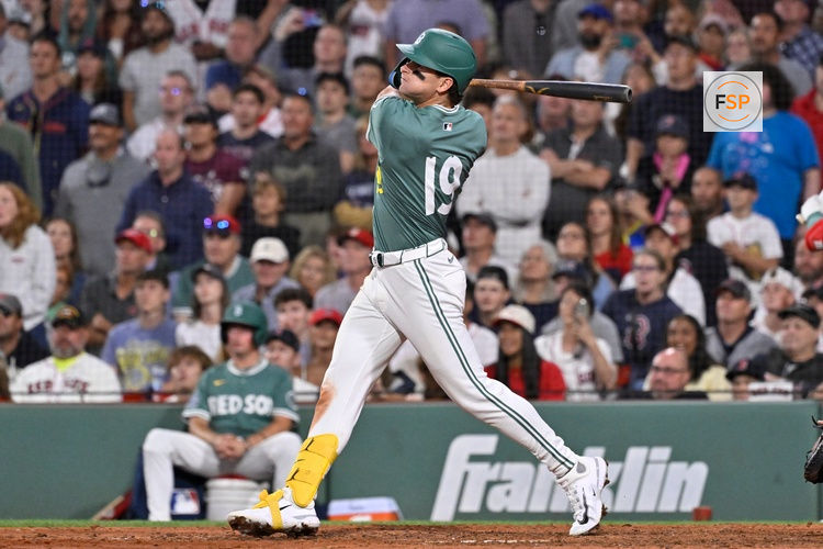 Aug 1, 2025; Boston, Massachusetts, USA; Boston Red Sox left fielder Roman Anthony (19) hits a game winning RBI against the Houston Astros during the tenth inning inning at Fenway Park. Credit: Eric Canha-Imagn Images