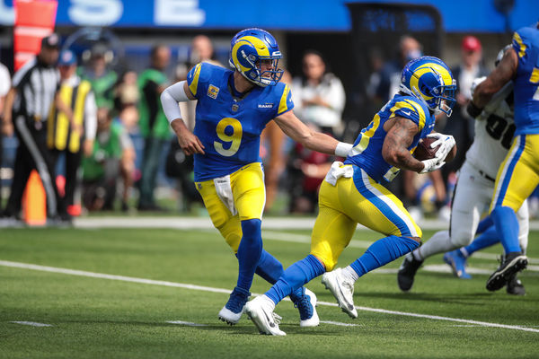 INGLEWOOD, CA - OCTOBER 8: Los Angeles Rams quarterback Matthew Stafford (9) hands off to Los Angeles Rams running back Kyren Williams (23) during the Philadelphia Eagles versus the Los Angeles Rams game on October 8, 2023, at SoFi Stadium in Inglewood, CA. (Photo by Jevone Moore/Icon Sportswire)