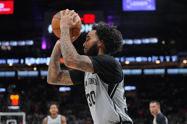 Mar 8, 2026; San Antonio, Texas, USA;  San Antonio Spurs forward Julian Champagnie (30) shoots in the second half against the Houston Rockets at Frost Bank Center. Mandatory Credit: Daniel Dunn-Imagn Images