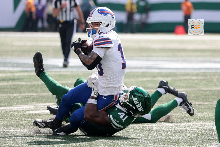 Sep 14, 2025; East Rutherford, New Jersey, USA; Buffalo Bills wide receiver Khalil Shakir (10) makes a catch over New York Jets linebacker Marcelino McCrary-Ball (41) during the second half at MetLife Stadium. Credit: Vincent Carchietta-Imagn Images