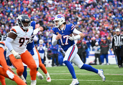 Jan 12, 2025; Orchard Park, New York, USA; Buffalo Bills quarterback Josh Allen (17) runs for a gain during the second quarter against the Denver Broncos in an AFC wild card game at Highmark Stadium. Mandatory Credit: Mark Konezny-Imagn Images