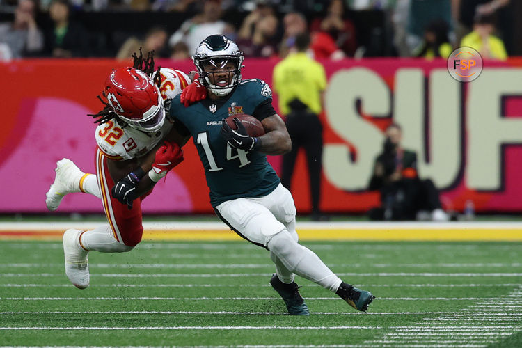 Feb 9, 2025; New Orleans, LA, USA; Philadelphia Eagles running back Kenneth Gainwell (14) runs with the ball after making a catch as Kansas City Chiefs linebacker Nick Bolton (32) makes the tackle during Super Bowl LIX at Caesars Superdome. Credit: Geoff Burke-Imagn Images