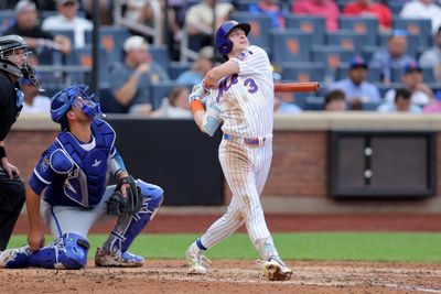 Jul 9, 2026; New York City, New York, USA; New York Mets right fielder Carson Benge (3) follows through on an RBI single against the Kansas City Royals during the fifth inning at Citi Field. Benge wound up on third base after a Royals error on the play. Mandatory Credit: Brad Penner-Imagn Images