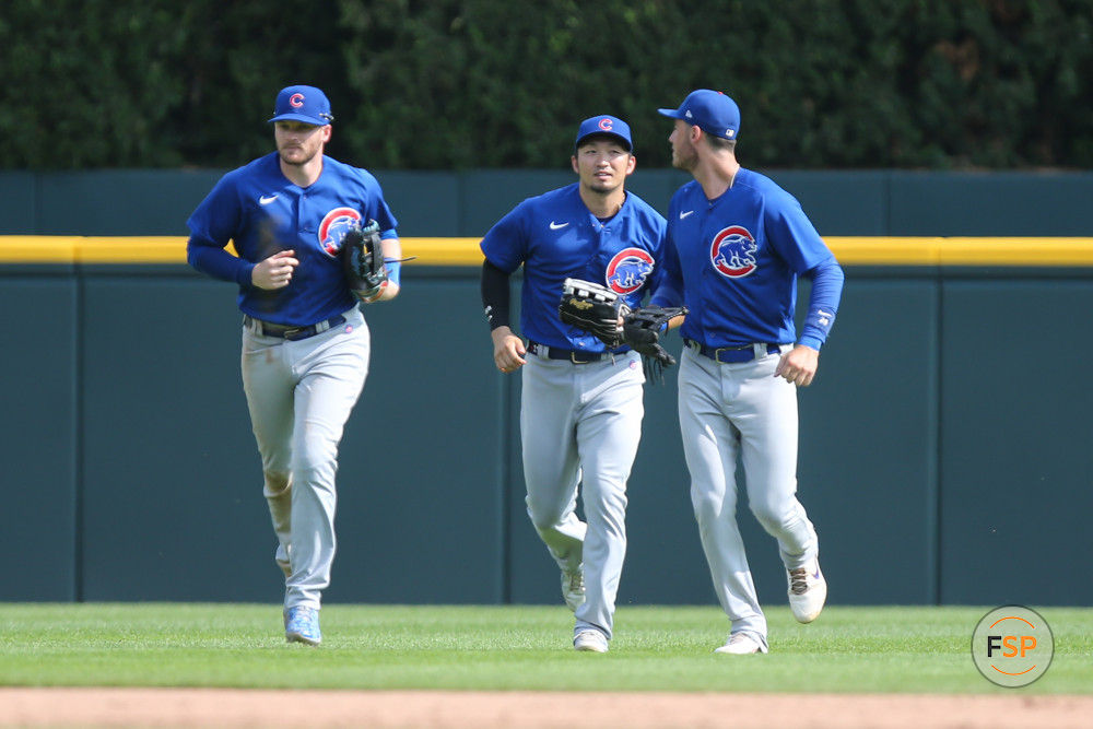 DETROIT, MI - AUGUST 23:  Chicago Cubs left fielder Ian Happ (8), left, Chicago Cubs right fielder Seiya Suzuki (27), center, and Chicago Cubs center fielder Cody Bellinger (24), right, jog in from the outfield at the conclusion of a regular season Major League Baseball game between the Chicago Cubs and the Detroit Tigers on August 23, 2023 at Comerica Park in Detroit, Michigan.  (Photo by Scott W. Grau/Icon Sportswire)