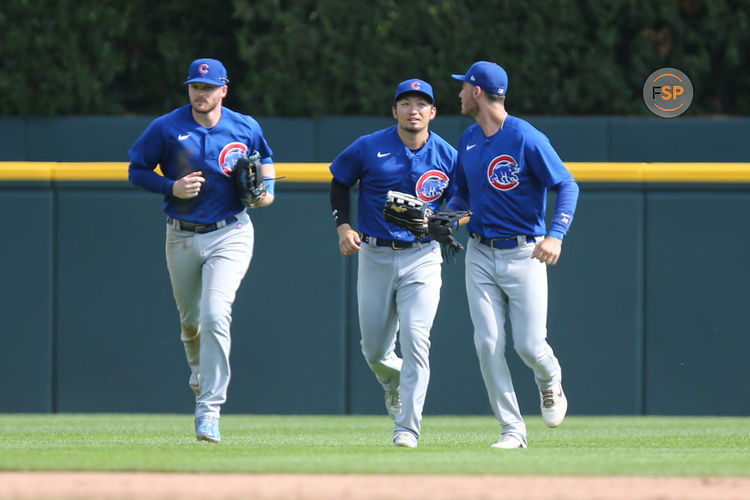 DETROIT, MI - AUGUST 23:  Chicago Cubs left fielder Ian Happ (8), left, Chicago Cubs right fielder Seiya Suzuki (27), center, and Chicago Cubs center fielder Cody Bellinger (24), right, jog in from the outfield at the conclusion of a regular season Major League Baseball game between the Chicago Cubs and the Detroit Tigers on August 23, 2023 at Comerica Park in Detroit, Michigan.  (Photo by Scott W. Grau/Icon Sportswire)