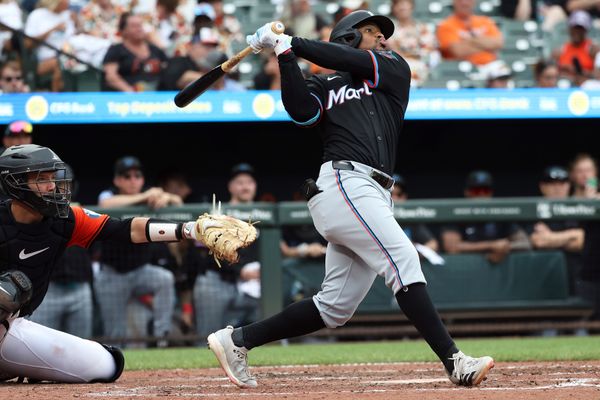 Jul 12, 2025; Baltimore, Maryland, USA; Miami Marlins shortstop Xavier Edwards (9) hits a double during the eighth inning against the Baltimore Orioles at Oriole Park at Camden Yards. Mandatory Credit: Daniel Kucin Jr.-Imagn Images