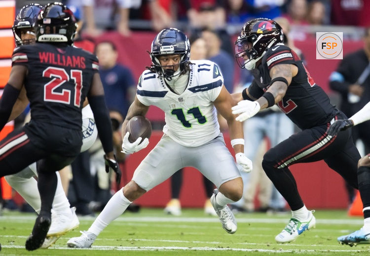 Dec 8, 2024; Glendale, Arizona, USA; Seattle Seahawks wide receiver Jaxon Smith-Njigba (11) against the Arizona Cardinals at State Farm Stadium. Credit: Mark J. Rebilas-Imagn Images