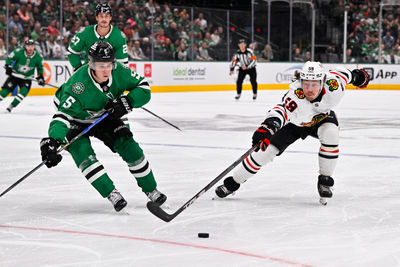 Oct 26, 2024; Dallas, Texas, USA; Dallas Stars defenseman Nils Lundkvist (5) and Chicago Blackhawks left wing Tyler Bertuzzi (59) in action during the game between the Dallas Stars and the Chicago Blackhawks at American Airlines Center. Mandatory Credit: Jerome Miron-Imagn Images