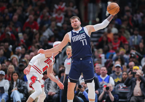 CHICAGO, IL - MARCH 11: Luka Doncic #77 of the Dallas Mavericks grabs a ball during the first half against the Chicago Bulls at United Center on March 11, 2024 in Chicago, Illinois. (Photo by Melissa Tamez/Icon Sportswire)