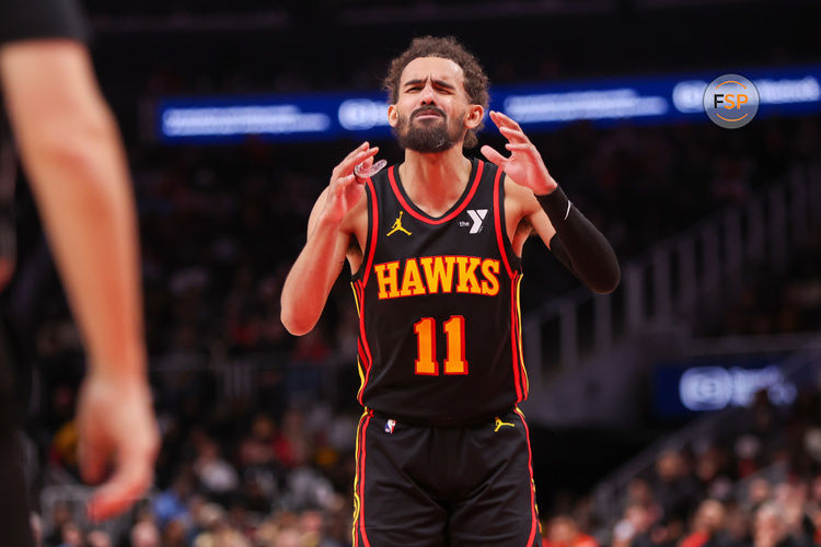 Jan 23, 2025; Atlanta, Georgia, USA; Atlanta Hawks guard Trae Young (11) reacts to a foul call by referee Pat Fraher (not pictured) against the Toronto Raptors in the fourth quarter at State Farm Arena. Credit: Brett Davis-Imagn Images
