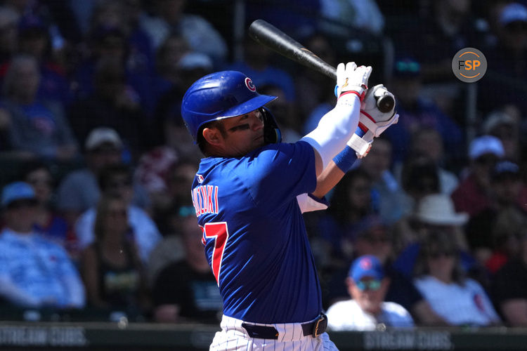 Mar 4, 2025; Mesa, Arizona, USA; Chicago Cubs outfielder Seiya Suzuki (27) hits against the San Diego Padres in the first inning at Sloan Park. Credit: Rick Scuteri-Imagn Images