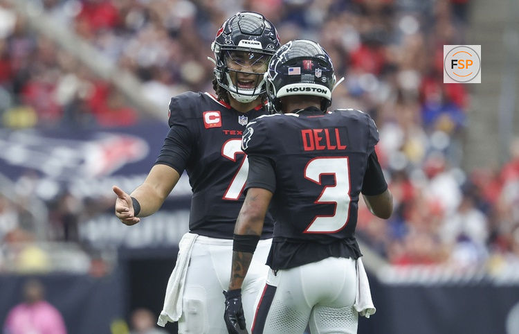 Oct 27, 2024; Houston, Texas, USA; Houston Texans quarterback C.J. Stroud (7) and wide receiver Tank Dell (3) react after a play during the fourth quarter against the Indianapolis Colts at NRG Stadium. Credit: Troy Taormina-Imagn Images