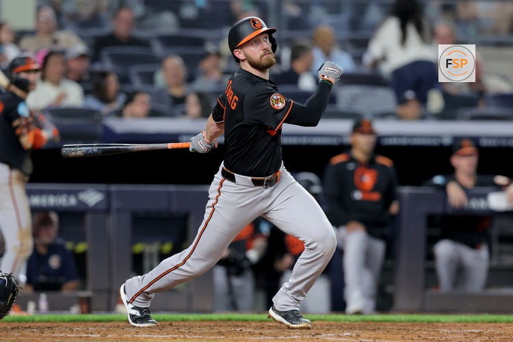 Sep 26, 2025; Bronx, New York, USA; Baltimore Orioles third baseman Jordan Westburg (11) follows through on a single against the New York Yankees during the fifth inning at Yankee Stadium. Credit: Brad Penner-Imagn Images
