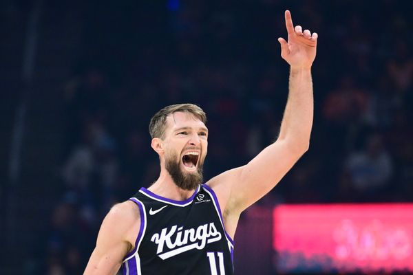 Jan 23, 2026; Cleveland, Ohio, USA; Sacramento Kings forward Domantas Sabonis (11) celebrates after hitting a three point basket against the Cleveland Cavaliers during the first half at Rocket Arena. Mandatory Credit: Ken Blaze-Imagn Images