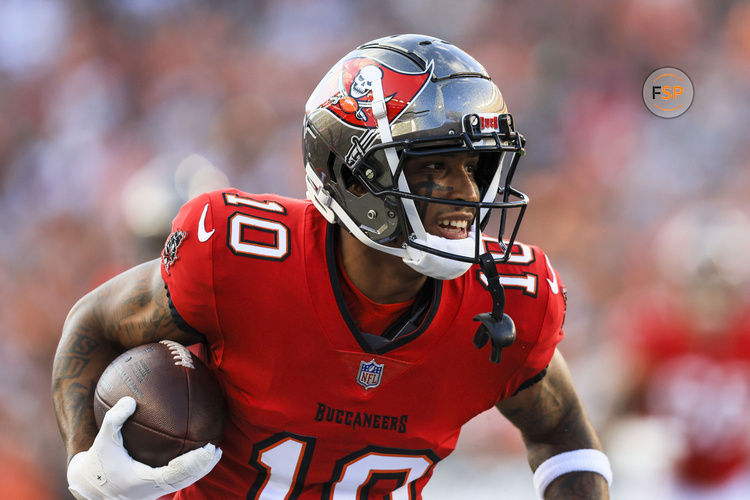 Aug 10, 2024; Cincinnati, Ohio, USA; Tampa Bay Buccaneers wide receiver Trey Palmer (10) runs with the ball against the Cincinnati Bengals in the first half at Paycor Stadium. Credit: Katie Stratman-USA TODAY Sports