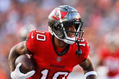 Aug 10, 2024; Cincinnati, Ohio, USA; Tampa Bay Buccaneers wide receiver Trey Palmer (10) runs with the ball against the Cincinnati Bengals in the first half at Paycor Stadium. Mandatory Credit: Katie Stratman-USA TODAY Sports