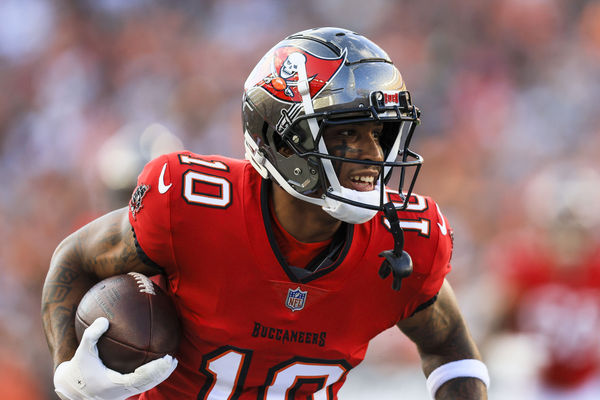 Aug 10, 2024; Cincinnati, Ohio, USA; Tampa Bay Buccaneers wide receiver Trey Palmer (10) runs with the ball against the Cincinnati Bengals in the first half at Paycor Stadium. Mandatory Credit: Katie Stratman-USA TODAY Sports