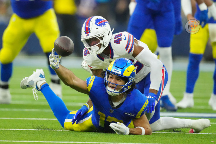 Dec 8, 2024; Inglewood, California, USA; Los Angeles Rams wide receiver Puka Nacua (17) attempts to catch the ball against Buffalo Bills cornerback Ja'Marcus Ingram (46) in the second half at SoFi Stadium. Credit: Kirby Lee-Imagn Images