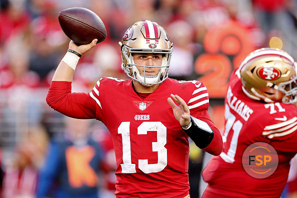 SANTA CLARA, CALIFORNIA - DECEMBER 04: Brock Purdy #13 of the San Francisco 49ers attempts a pass during the fourth quarter at Levi's Stadium on December 04, 2022 in Santa Clara, California. (Photo by Ezra Shaw/Getty Images)