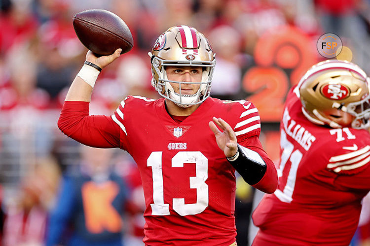 SANTA CLARA, CALIFORNIA - DECEMBER 04: Brock Purdy #13 of the San Francisco 49ers attempts a pass during the fourth quarter at Levi's Stadium on December 04, 2022 in Santa Clara, California. (Photo by Ezra Shaw/Getty Images)