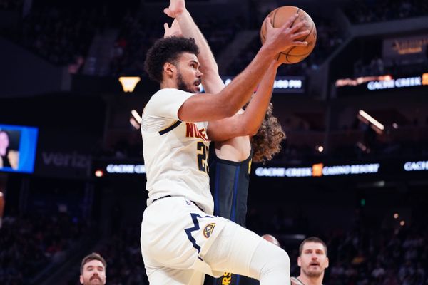 Feb 22, 2026; San Francisco, California, USA;  Denver Nuggets forward Cameron Johnson (23) drives to the basket against Golden State Warriors guard Brandin Podziemski (2) in the third quarter at Chase Center. Mandatory Credit: David Gonzales-Imagn Images
