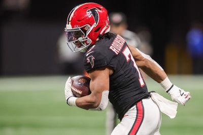 Dec 29, 2025; Atlanta, Georgia, USA; Atlanta Falcons running back Bijan Robinson (7) runs the ball against the Los Angeles Rams in the third quarter at Mercedes-Benz Stadium. Mandatory Credit: Brett Davis-Imagn Images