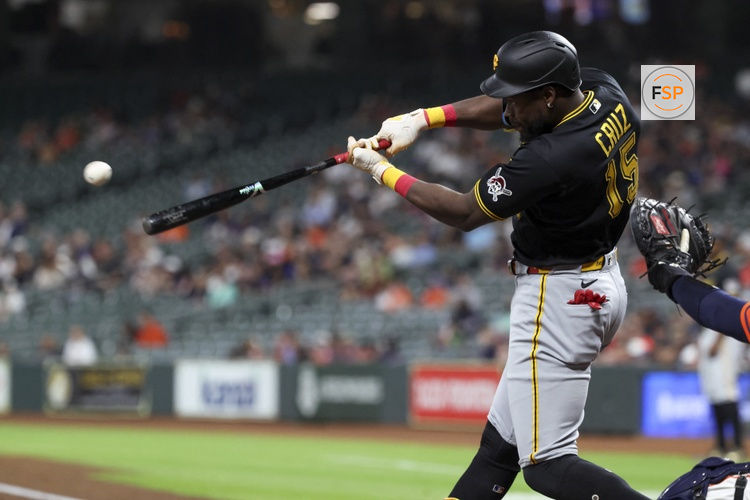 Jun 3, 2026; Houston, Texas, USA; Pittsburgh Pirates center fielder Oneil Cruz (15) hits a single during the second inning against the Houston Astros at Daikin Park. Credit: Troy Taormina-Imagn Images