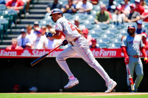 Jun 29, 2025; Anaheim, California, USA;  Washington Nationals left fielder James Wood (29) hits a single against the Los Angeles Angels during the first inning at Angel Stadium. Mandatory Credit: Gary A. Vasquez-Imagn Images
