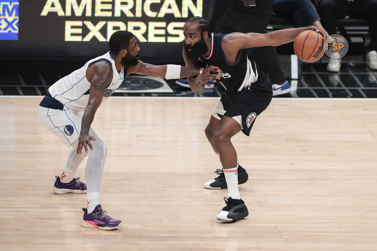 LOS ANGELES, CA - APRIL 23: LA Clippers guard James Harden (1) dribbles on Dallas Mavericks guard Kyrie Irving (11) during game 2 of the first round of the Western Conference playoffs between the Dallas Mavericks and the LA Clippers on April 23, 2024, at Crypto.com Arena in Los Angeles, CA. (Photo by Jevone Moore/Icon Sportswire)