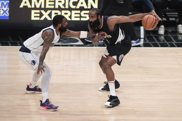 LOS ANGELES, CA - APRIL 23: LA Clippers guard James Harden (1) dribbles on Dallas Mavericks guard Kyrie Irving (11) during game 2 of the first round of the Western Conference playoffs between the Dallas Mavericks and the LA Clippers on April 23, 2024, at Crypto.com Arena in Los Angeles, CA. (Photo by Jevone Moore/Icon Sportswire)