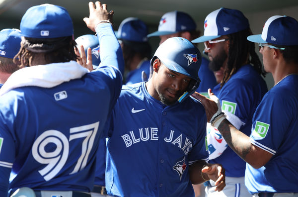 Feb 27, 2025; Sarasota, Florida, USA;Toronto Blue Jays second base Orelvis Martinez (13) scores a run during the fourth inning against the Baltimore Orioles  at Ed Smith Stadium. Mandatory Credit: Kim Klement Neitzel-Imagn Images