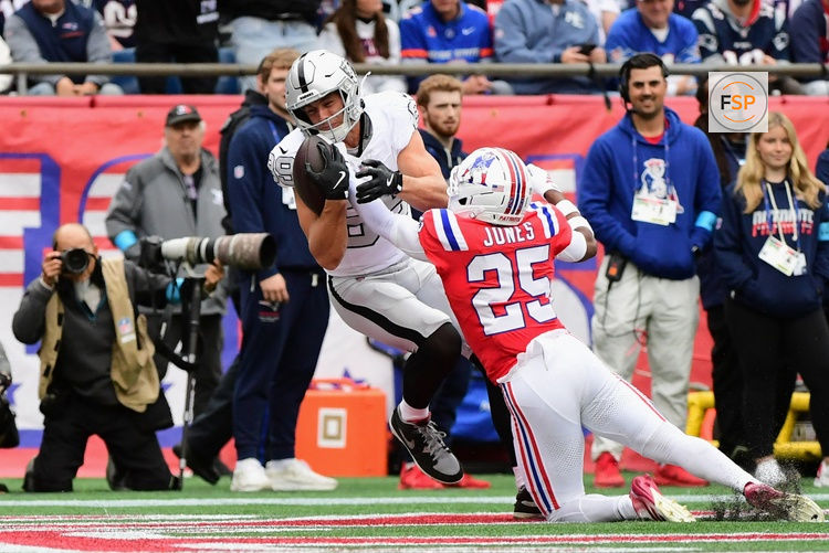 Oct 11, 2026; Foxborough, Massachusetts, USA;  Las Vegas Raiders tight end Brock Bowers (89) catches a thirteen-yard touchdown pass from quarterback Kirk Cousins (not pictured) against New England Patriots cornerback Marcus Jones (25) during the first quarter at Gillette Stadium.  Credit: Bob DeChiara-Imagn Images