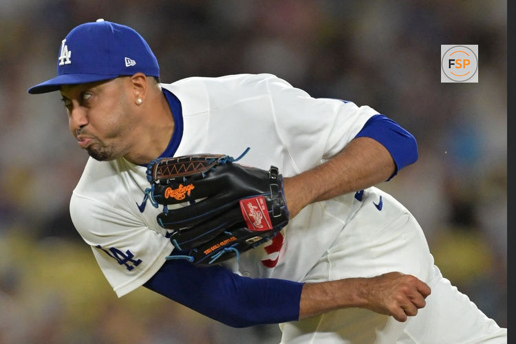 Aug 13, 2026; Los Angeles, California, USA;  Los Angeles Dodgers relief pitcher Edwin Diaz (3) delivers to the plate in the ninth inning against the Milwaukee Brewers at Dodger Stadium. Credit: Jayne Kamin-Oncea-Imagn Images