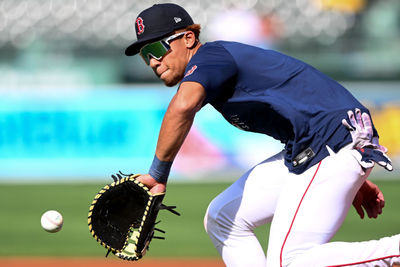 May 17, 2025; Boston, Massachusetts, USA; Boston Red Sox second baseman Kristian Campbell (28) fields the ball at first base during warmups before a game against the Atlanta Braves at Fenway Park. Mandatory Credit: Brian Fluharty-Imagn Images