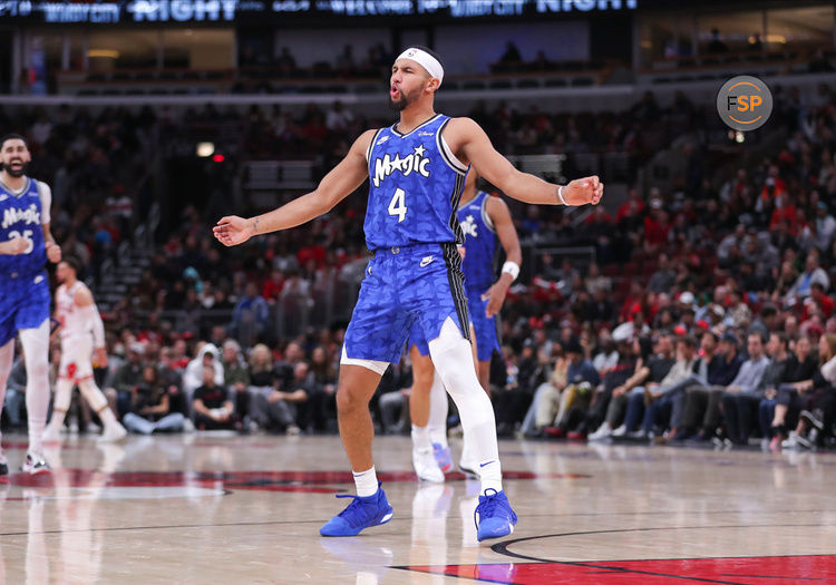 CHICAGO, IL - NOVEMBER 15: Jalen Suggs (4) of the Orlando Magic reacts after a play against the Chicago Bulls during the second half at the United Center on November 15, 2023 in Chicago, Illinois. (Photo by Melissa Tamez/Icon Sportswire)