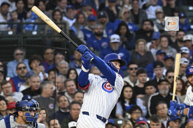 Apr 23, 2025; Chicago, Illinois, USA;  Chicago Cubs outfielder Pete Crow-Armstrong (4) hits a three-run home run during the fourth inning against the Los Angeles Dodgers at Wrigley Field. Credit: Matt Marton-Imagn Images