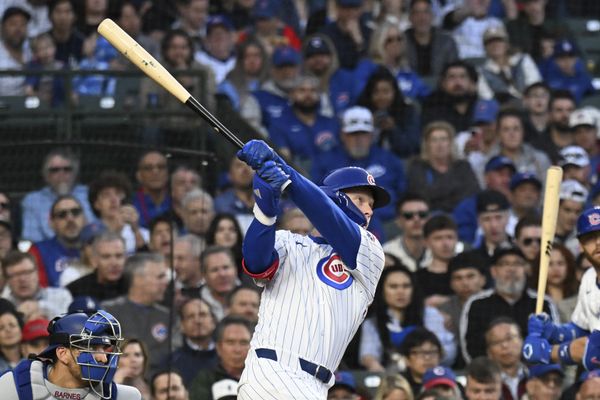 Apr 23, 2025; Chicago, Illinois, USA;  Chicago Cubs outfielder Pete Crow-Armstrong (4) hits a three-run home run during the fourth inning against the Los Angeles Dodgers at Wrigley Field. Mandatory Credit: Matt Marton-Imagn Images