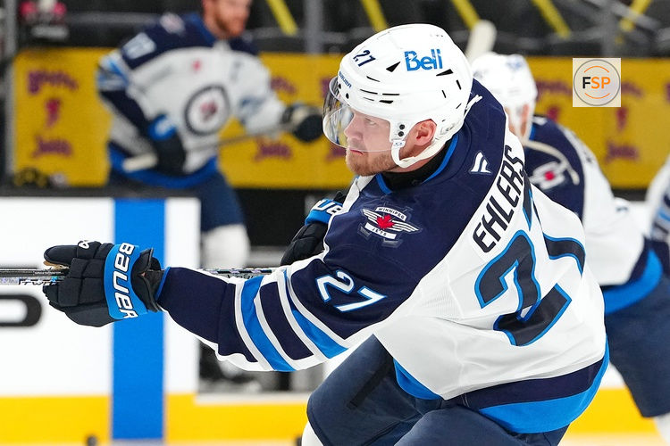Apr 3, 2025; Las Vegas, Nevada, USA; Winnipeg Jets left wing Nikolaj Ehlers (27) warms up before a game against the Vegas Golden Knights at T-Mobile Arena. Credit: Stephen R. Sylvanie-Imagn Images