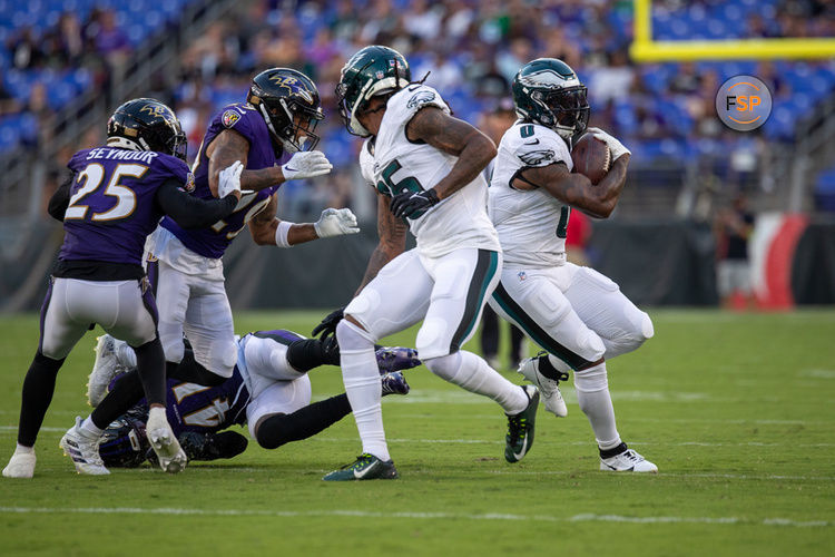 BALTIMORE, MD - AUGUST 12: Philadelphia Eagles running back D'Andre Swift (0) breaks a tackle and keeps running during an NFL pre-season game between the Philadelphia Eagles and the Baltimore Ravens on August 12, 2023, at M&T Bank Stadium in Baltimore, Maryland. (Photo by Charles Brock/Icon Sportswire)