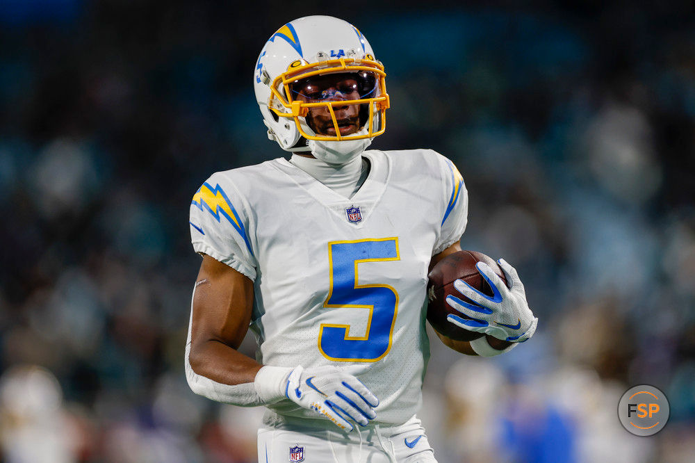 JACKSONVILLE, FL - JANUARY 14: Los Angeles Chargers wide receiver Joshua Palmer (5) runs with the ball during the game between the Los Angeles Chargers and the Jacksonville Jaguars on January 14, 2023 at TIAA Bank Field in Jacksonville, Fl. (Photo by David Rosenblum/Icon Sportswire)