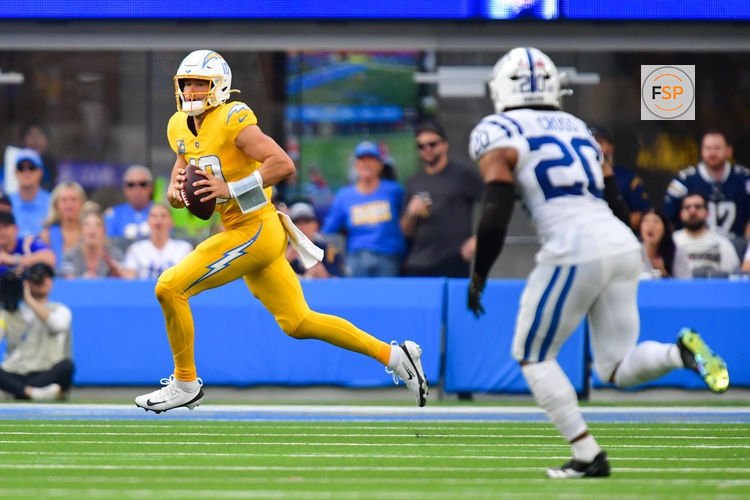 Oct 19, 2025; Inglewood, California, USA; Los Angeles Chargers quarterback Justin Herbert (10) runs the ball in the second half against the Indianapolis Colts at SoFi Stadium. Credit: Gary A. Vasquez-Imagn Images