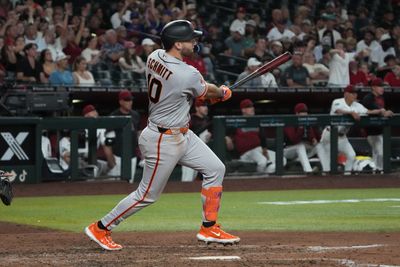 Jun 29, 2026; Phoenix, Arizona, USA; San Francisco Giants left fielder Casey Schmitt (10) hits a RBI sacrifice fly out against the Arizona Diamondbacks in the eighth inning at Chase Field. Mandatory Credit: Rick Scuteri-Imagn Images