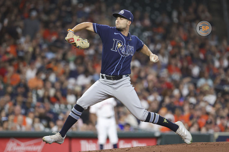 Oct 1, 2022; Houston, Texas, USA; Tampa Bay Rays starting pitcher Shane McClanahan (18) delivers a pitch during the first inning against the Houston Astros at Minute Maid Park. Credit: Troy Taormina-USA TODAY Sports