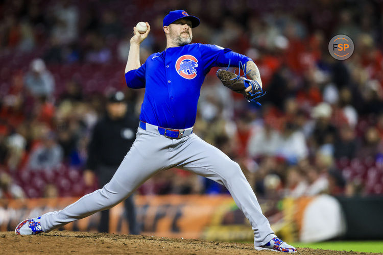 May 23, 2025; Cincinnati, Ohio, USA; Chicago Cubs relief pitcher Ryan Pressly (55) pitches against the Cincinnati Reds in the ninth inning at Great American Ball Park. Credit: Katie Stratman-Imagn Images