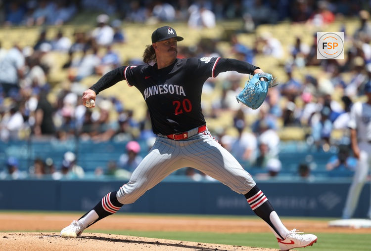 Jul 23, 2025; Los Angeles, California, USA; Minnesota Twins starting pitcher Chris Paddack (20) throws during the second inning against the Los Angeles Dodgers at Dodger Stadium. Credit: Kiyoshi Mio-Imagn Images