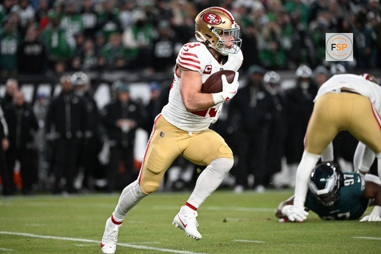 Jan 11, 2026; Philadelphia, PA, USA; San Francisco 49ers running back Christian McCaffrey (23) carries the ball against the Philadelphia Eagles during the first quarter in an NFC Wild Card Round game at Lincoln Financial Field. Credit: Eric Hartline-Imagn Images