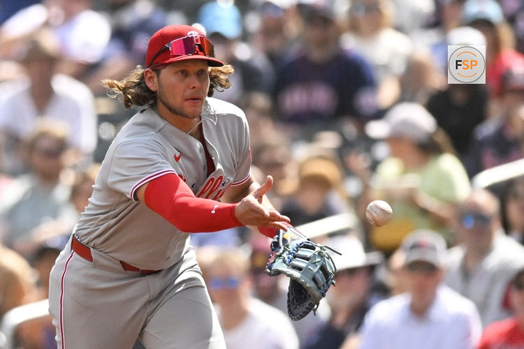 Aug 16, 2026; Minneapolis, Minnesota, USA; Philadelphia Phillies infielder Alec Bohm (28) flips to first for a force out against the Minnesota Twins during the second inning at Target Field. Credit: Nick Wosika-Imagn Images