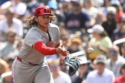 Aug 16, 2026; Minneapolis, Minnesota, USA; Philadelphia Phillies infielder Alec Bohm (28) flips to first for a force out against the Minnesota Twins during the second inning at Target Field. Mandatory Credit: Nick Wosika-Imagn Images